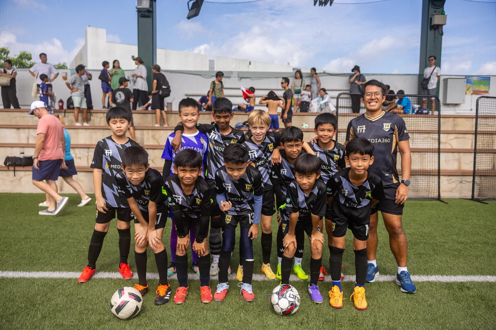 F17 U11 team and coaches together after a match